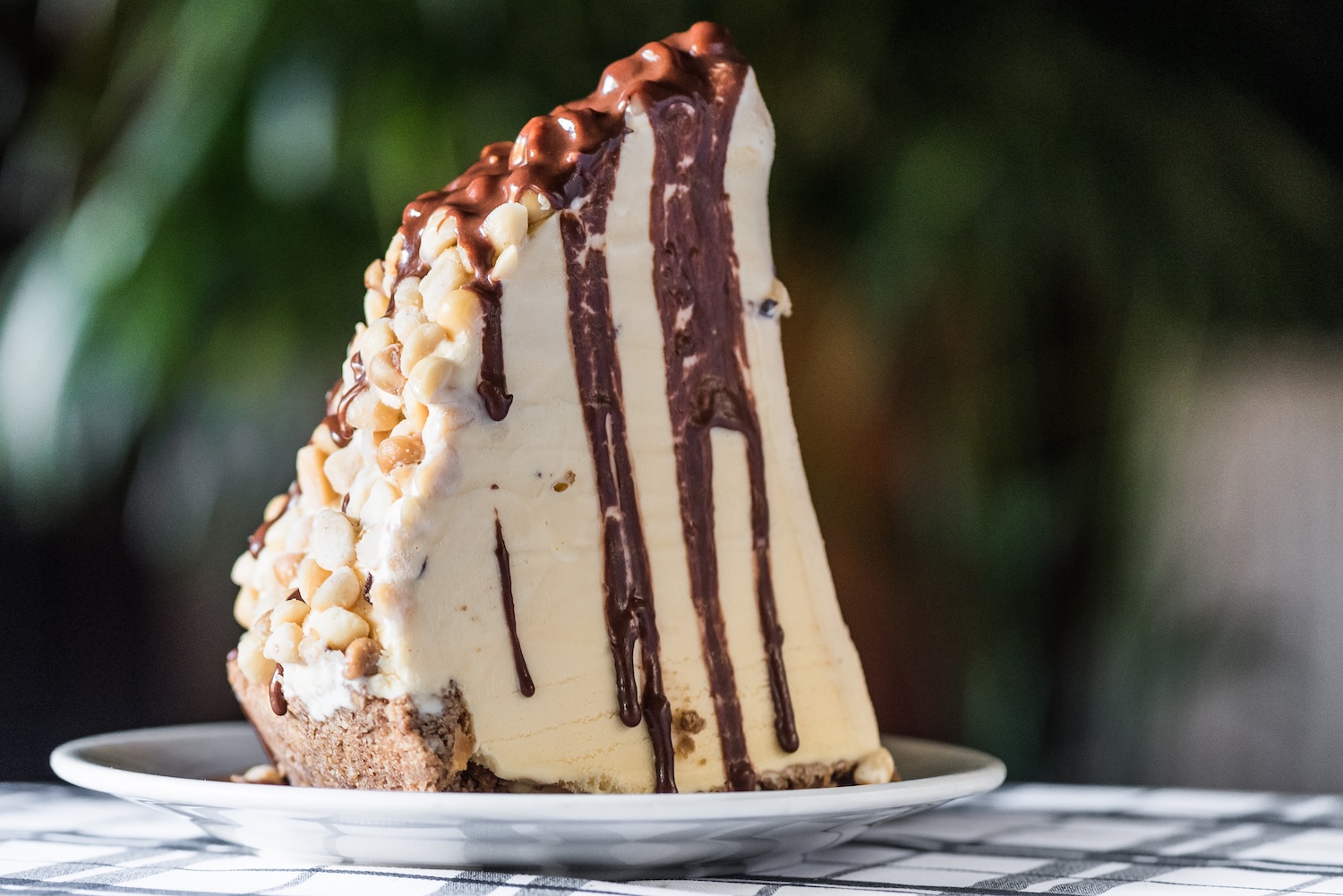 Macadamia Turtle Pie: A signature decadent dessert featuring a rich combination of buttery macadamia 