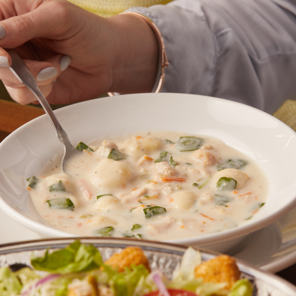 Chicken & Gnocchi: A creamy soup made with roasted chicken, Italian dumplings and spinach.