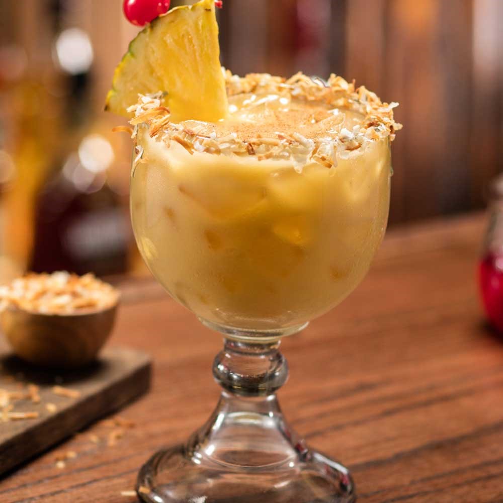 Cheddar’s Painkiller: Pusser’s rum, cream of coconut, pineapple juice, orange juice, toasted coconut rim, topped with nutmeg. Limit 2 per guest.