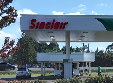 Sinclair gas station fueling island
