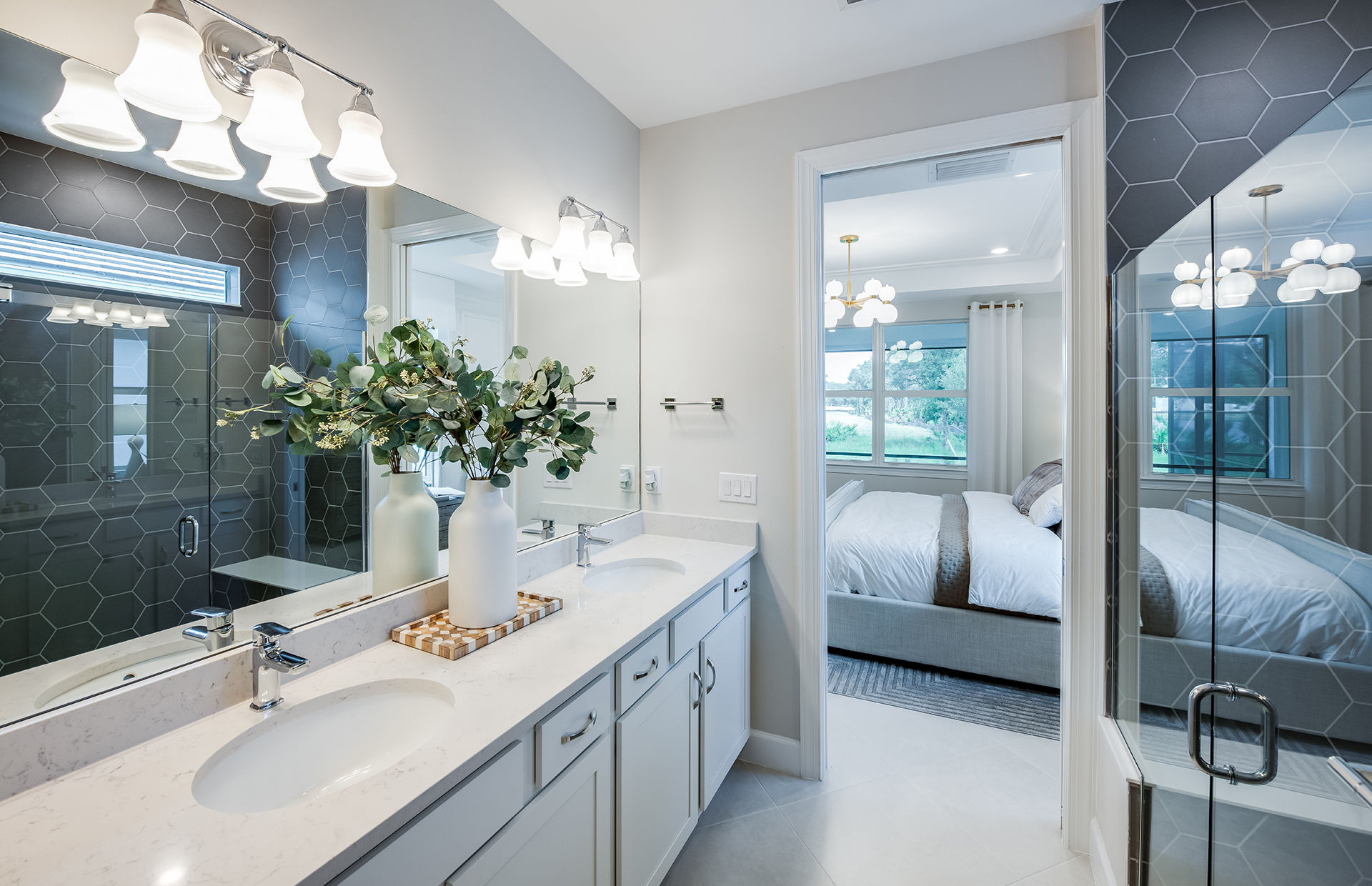 Owner's bathroom with double sink vanity and spacious walk-in closet