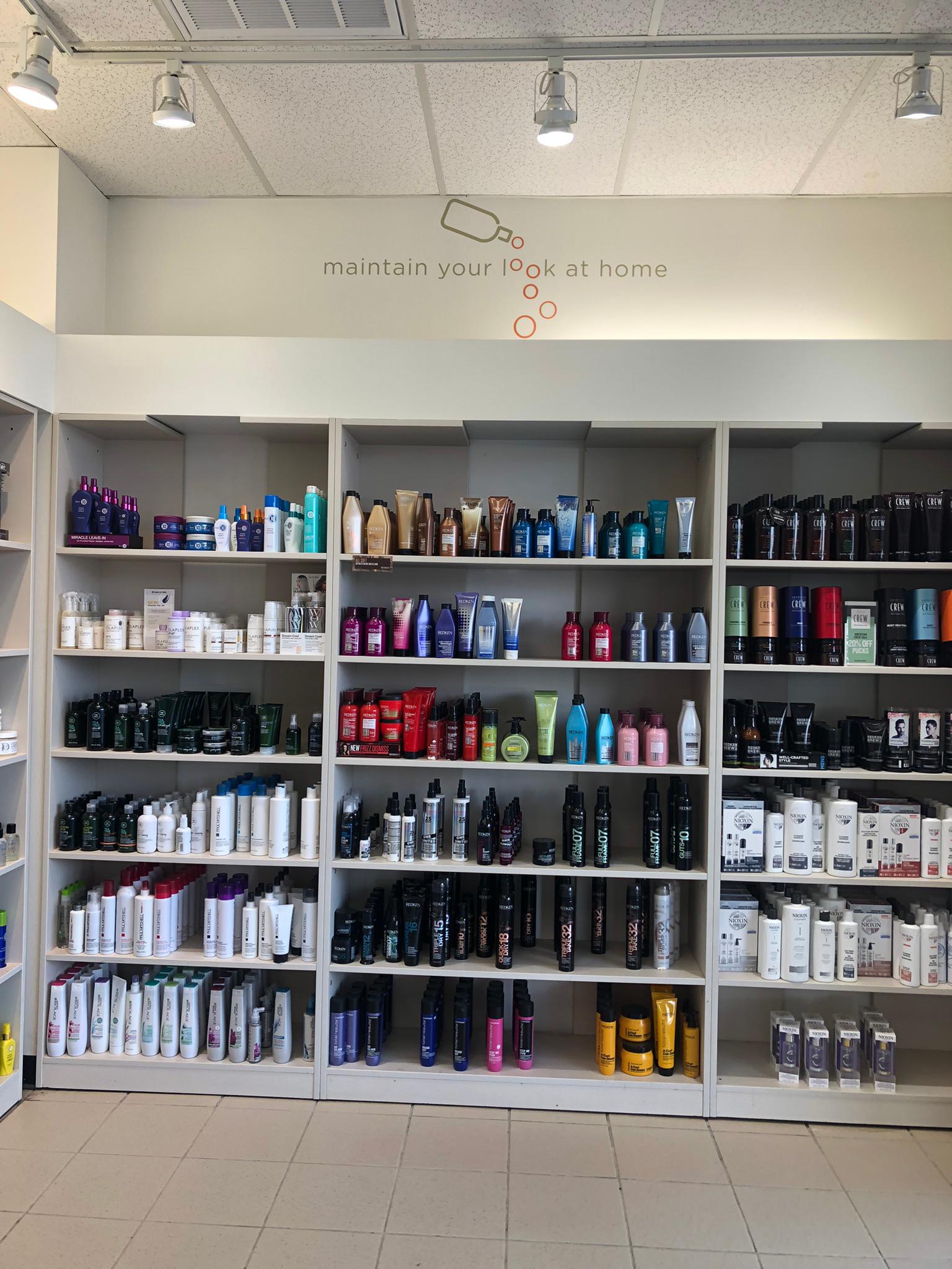 The shelves with products available for purchase at a Hair Cuttery Salon.