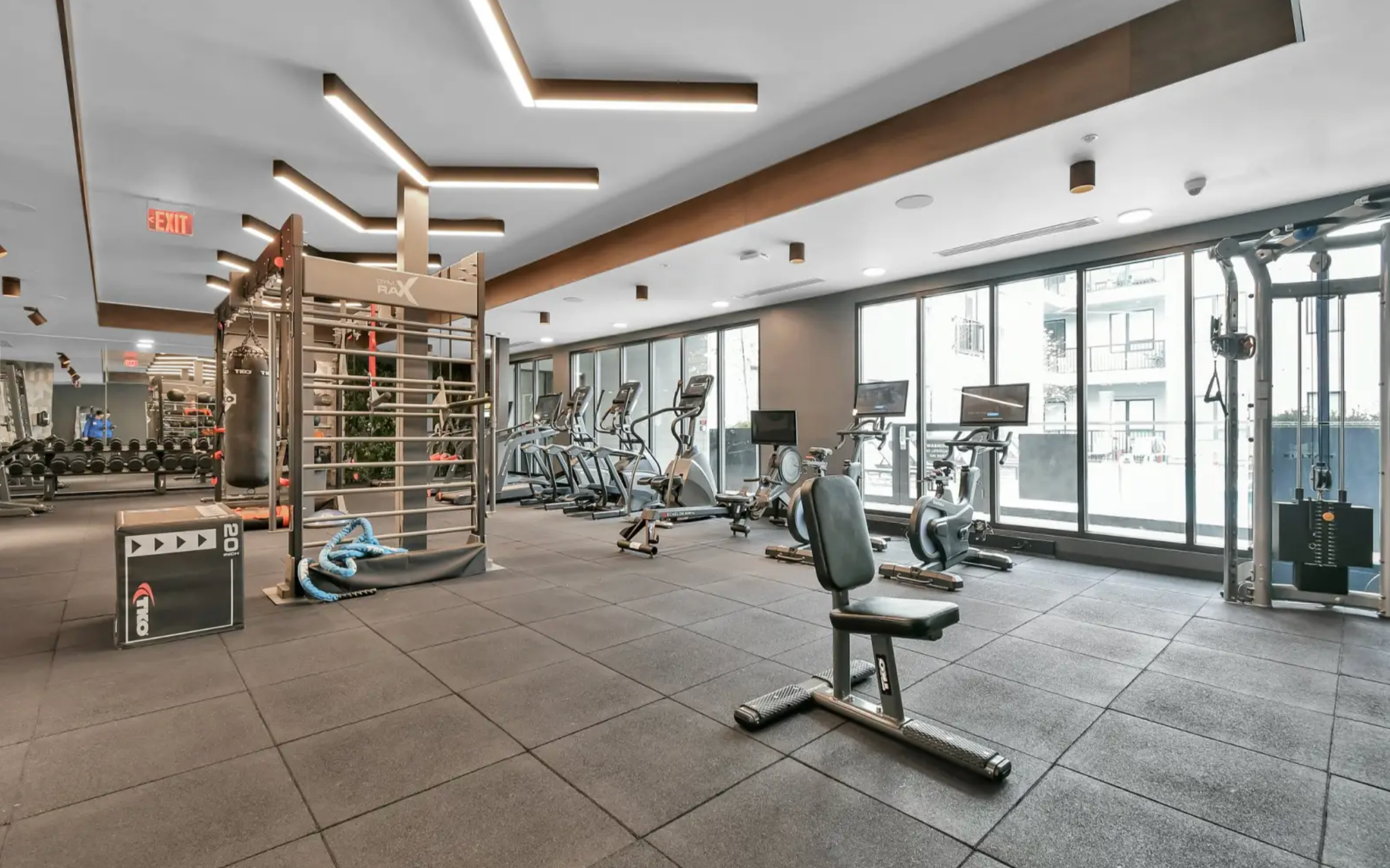 24hr Fitness Center with free weights and cardio machines. 