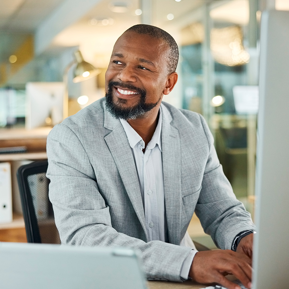 A business man sitting and looking to his right