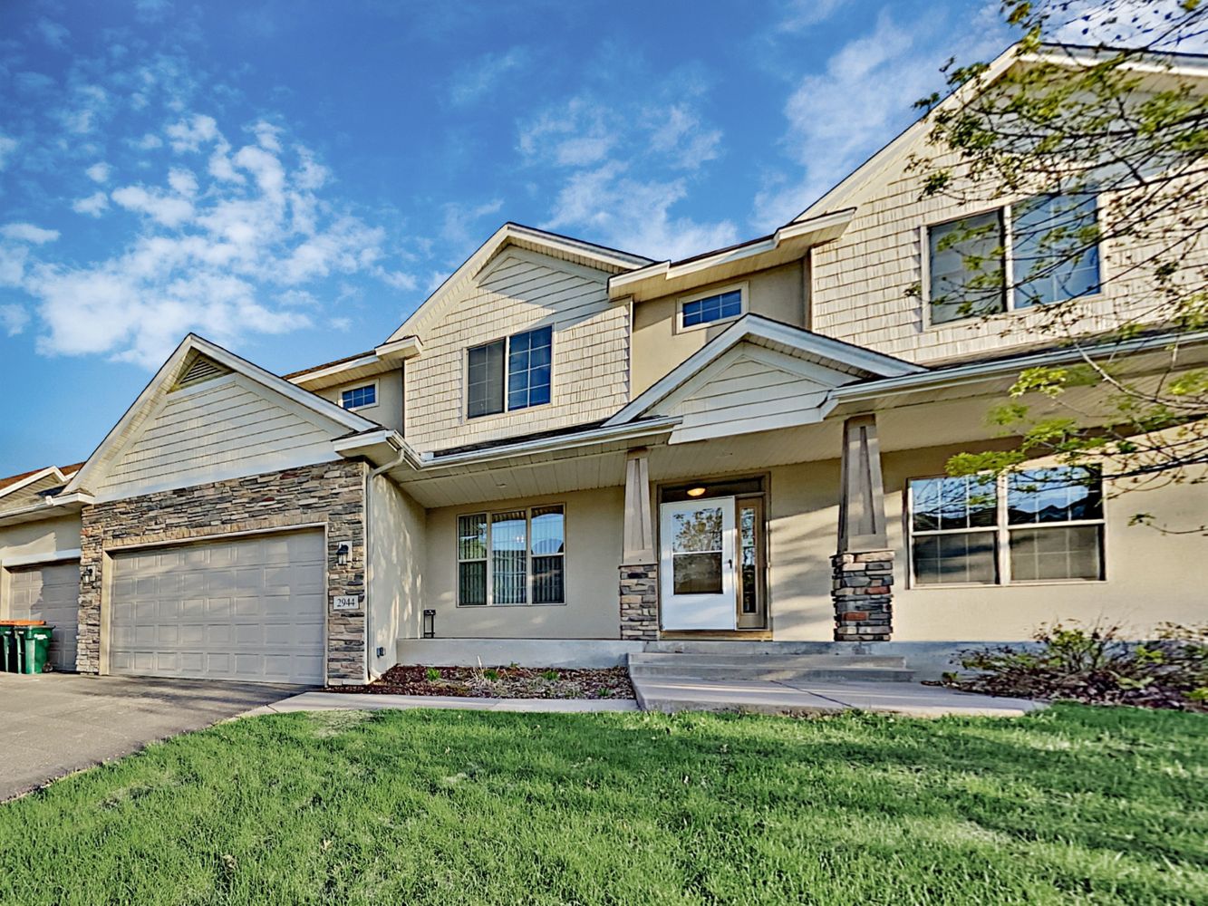 Stunning two-story home with garage at Invitation Homes Minneapolis.