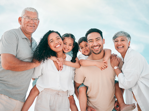 A multigenerational family posing together.