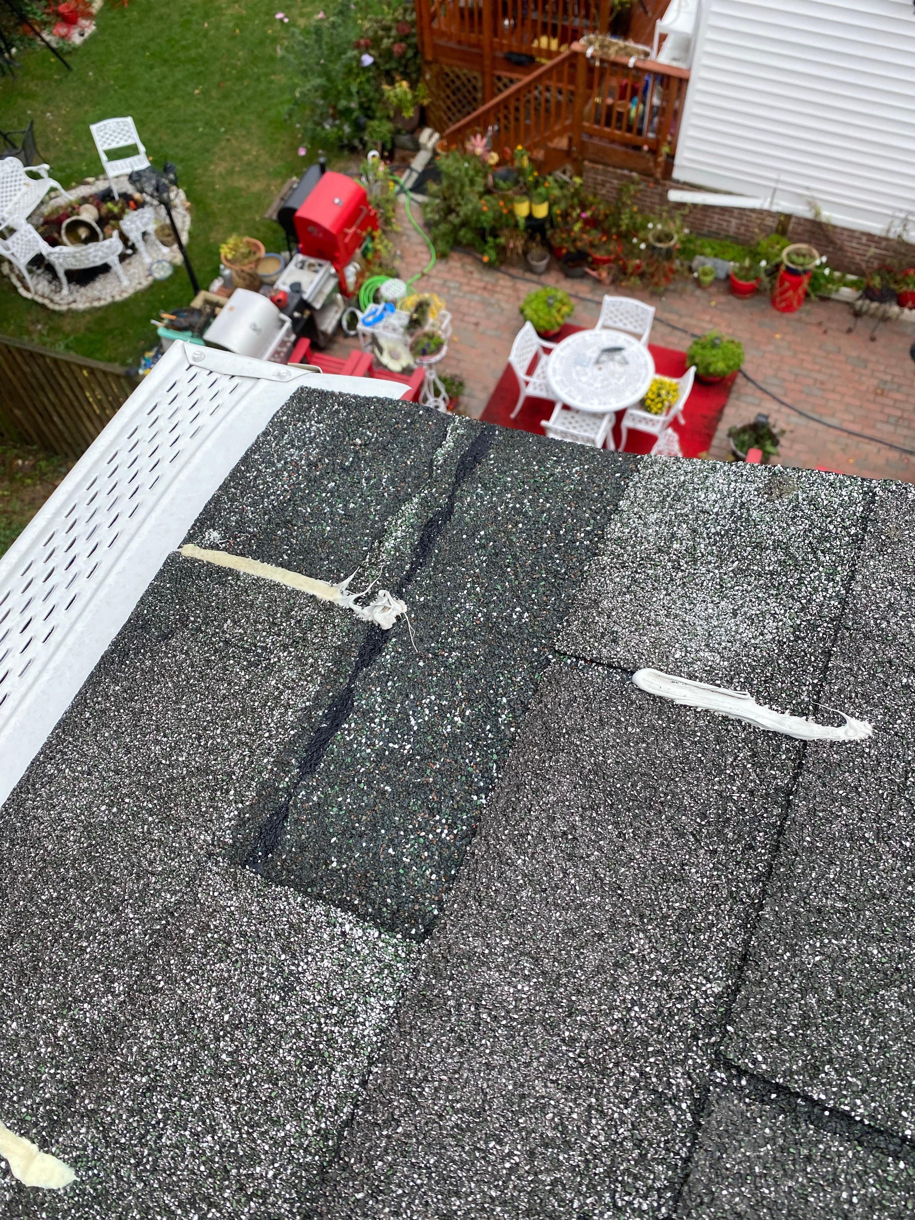 Wind damage found on an old 3 tab shingled roof