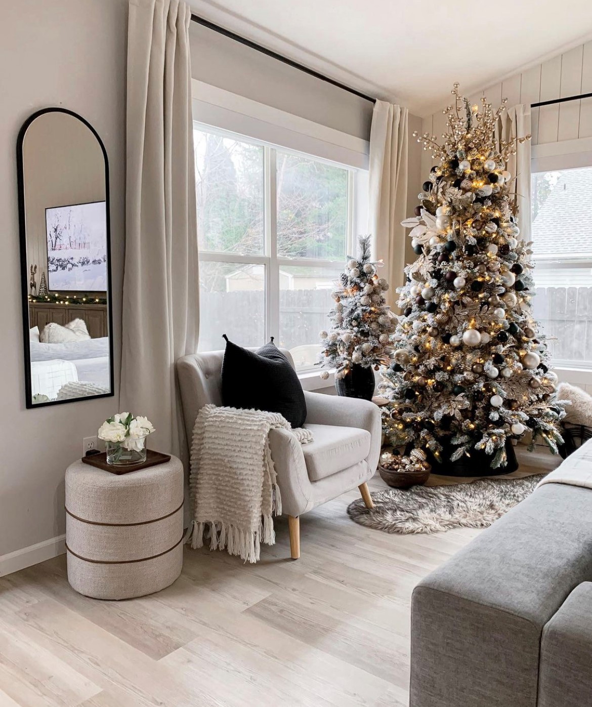 Treat yourself to new window treatments for your living room. Let our team at Budget Blinds of Rockwall, Terrell, and Greenville help you gift yourself with the perfect shade and drapery combo.
