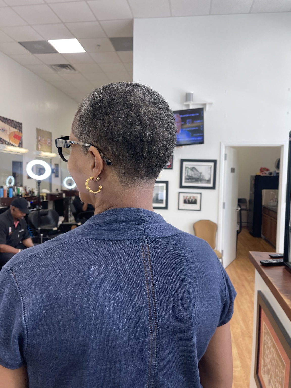 Short tapered haircut at The Ultimate Barber.
