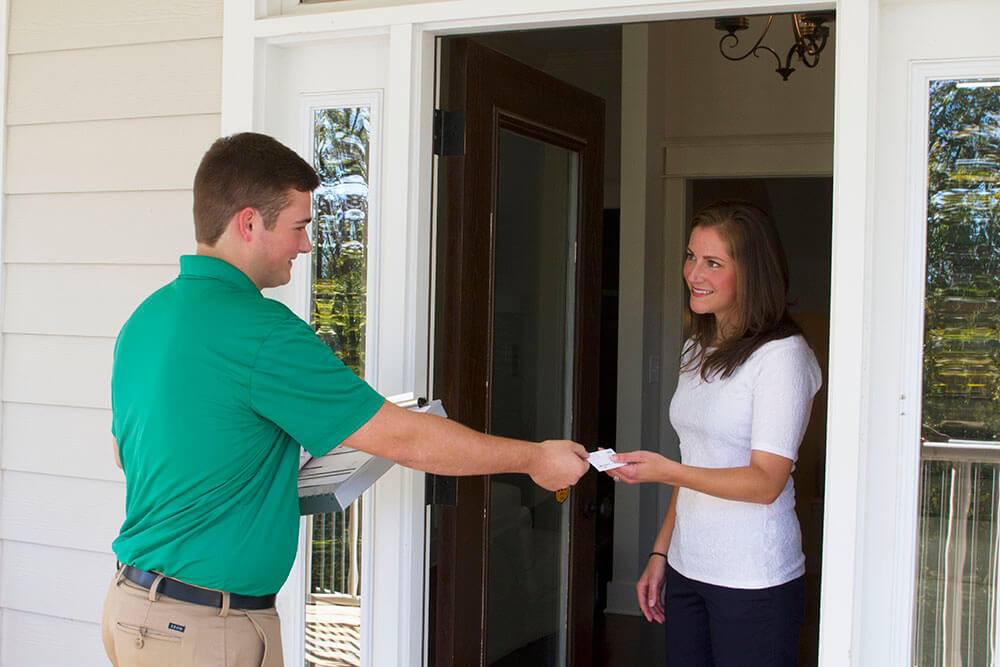 Southside Chem-Dry technician greeting a customer in Chesapeake home