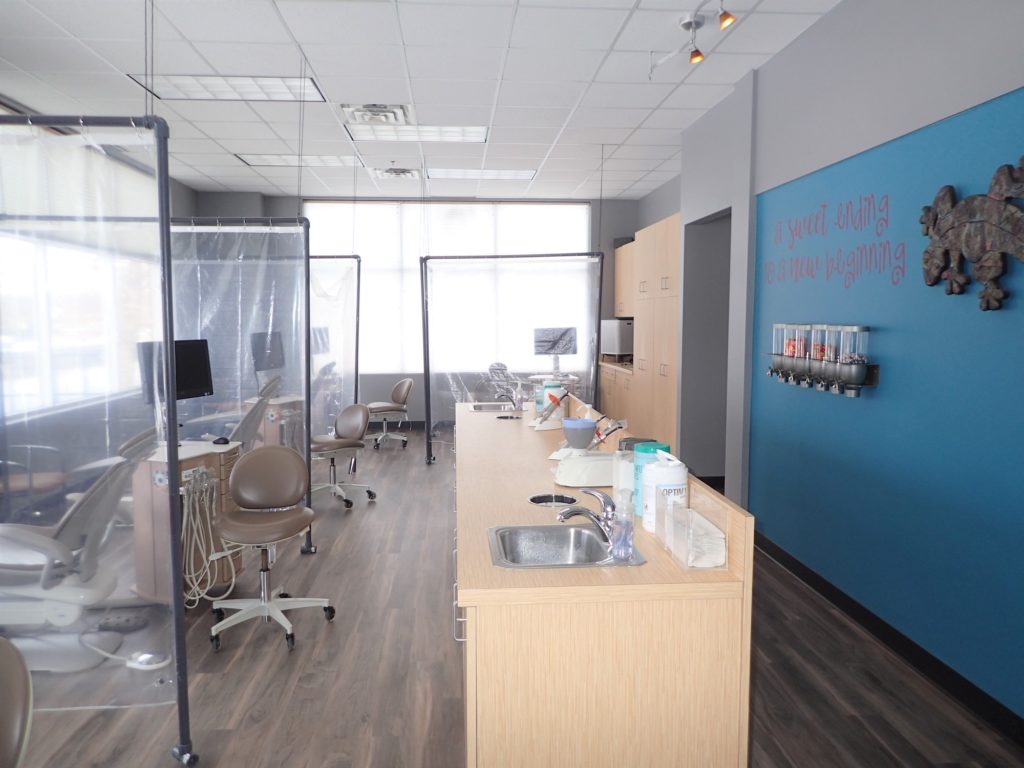 A glimpse into our modern and comfortable treatment area at Imagine Orthodontics. We prioritize patient safety and comfort with clean, well-lit spaces.