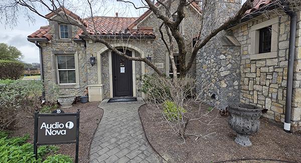 Exterior photo of front entrance of the AudioNova hearing clinic in McKinney, TX