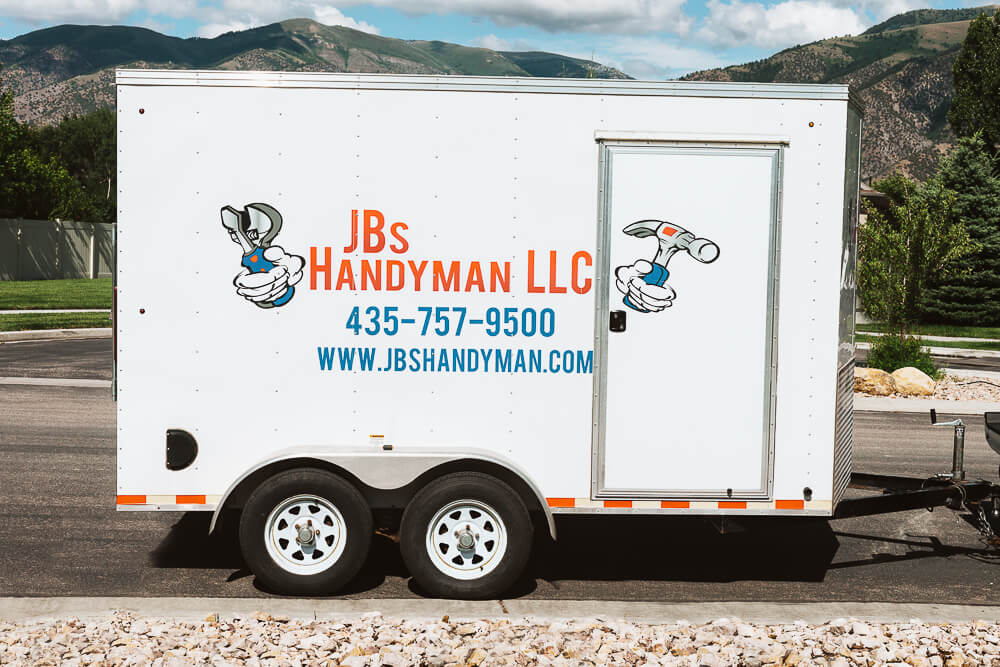 JBs Handyman trailer parked on street