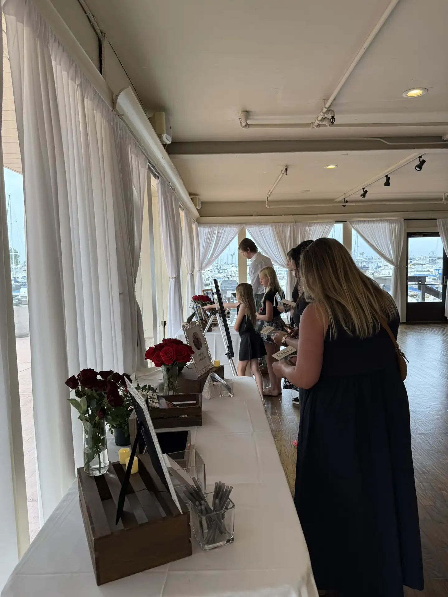 Vibrant reception event captured at dusk during a memorial gathering