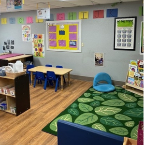 Bright and colorful preschool classroom at Childcare Network with age-appropriate learning materials