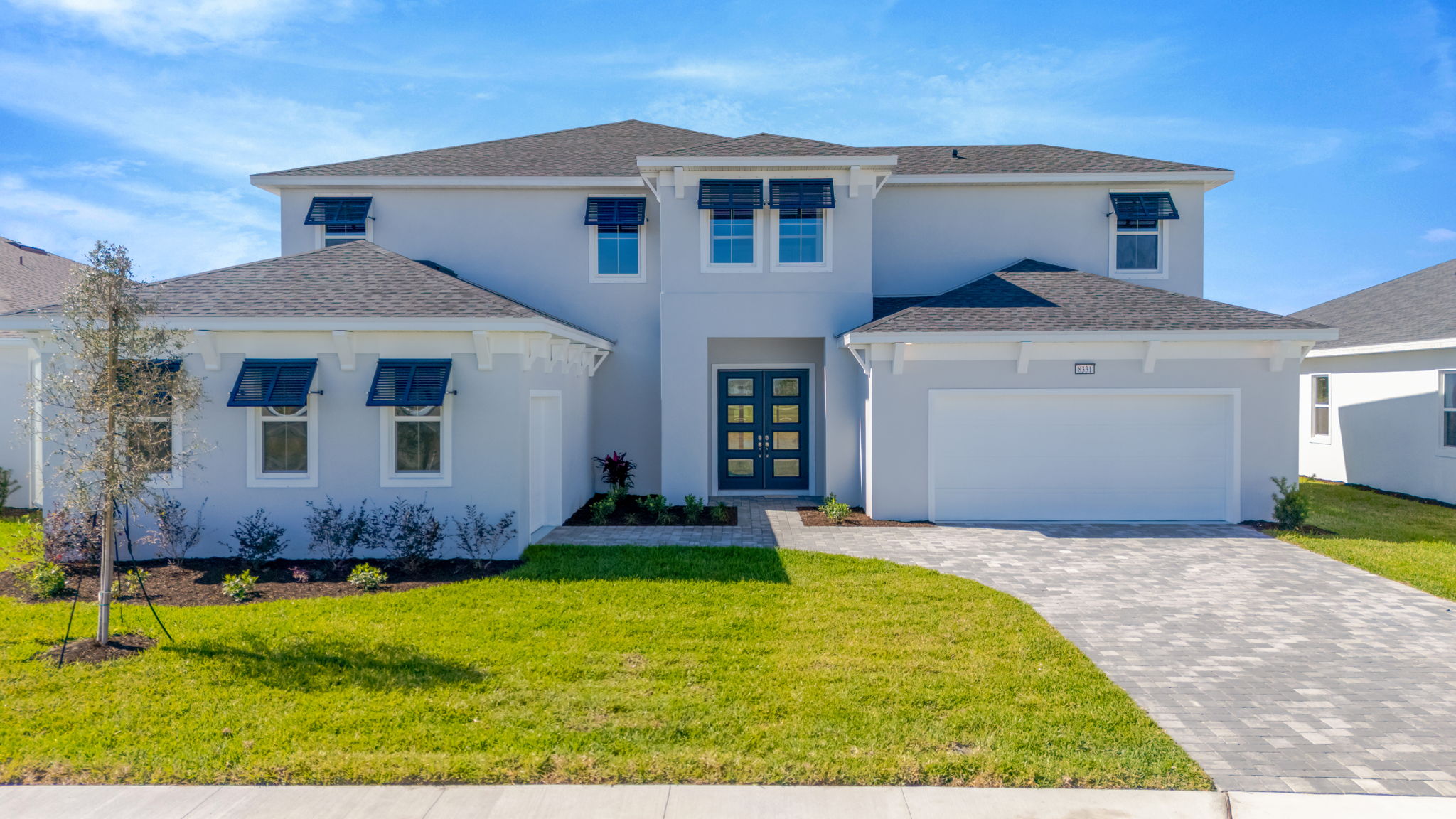 The Front Elevation of a DRB Homes Quick Move-In Home at Biscayne Landing at Seaire in Parrish, FL.