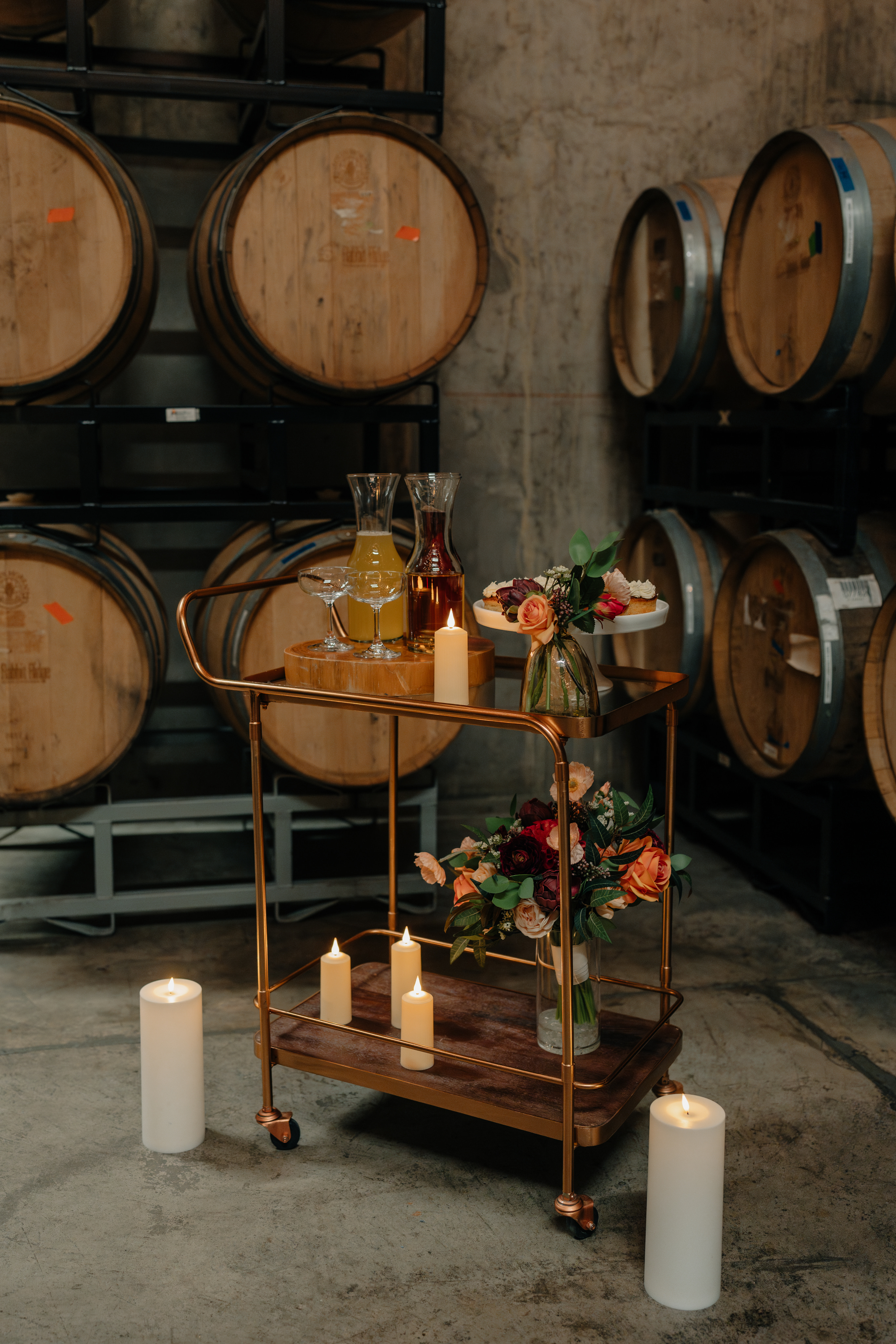 A curated beverage presentation highlights Acreage's award-winning ciders and hospitality-driven event experiences.