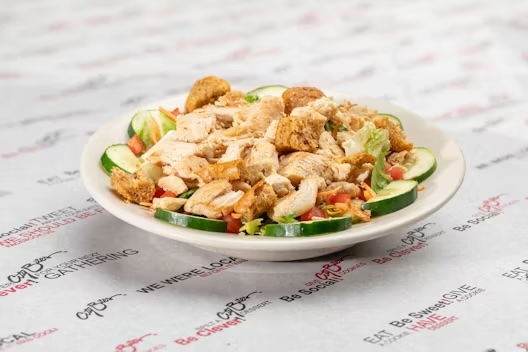 Mesquite chicken, lettuce mix, tomatoes, cucumbers, & sun-dried tomato croutons.