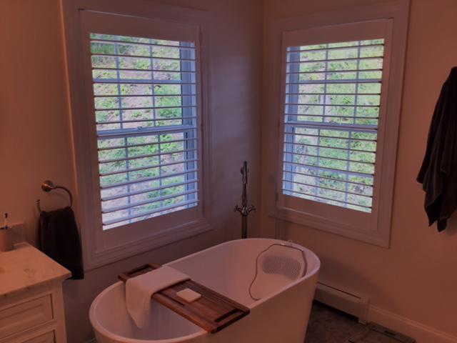 Our Composite Shutters have such a clean, elegant look. That’s why they work so well in bathrooms like this one in Croton on Hudson! Makes us want to enjoy a cozy bubble bath! #BudgetBlindsOssining #CrotonOnHudsonNY #CompositeShutters #MoistureResistantShutters #FreeConsultation #WindowWednesday