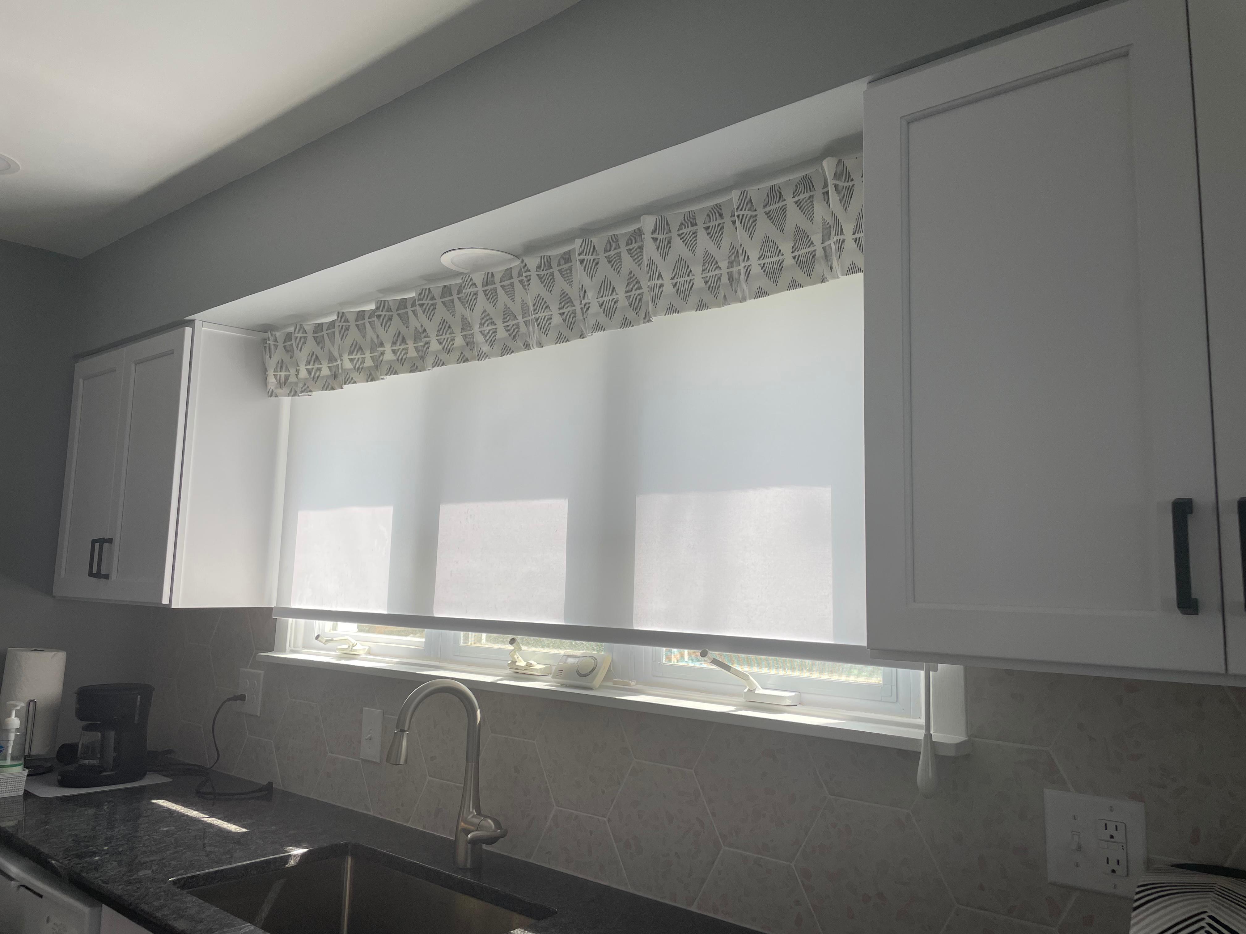 Easy to use roller shade with fabric valance.