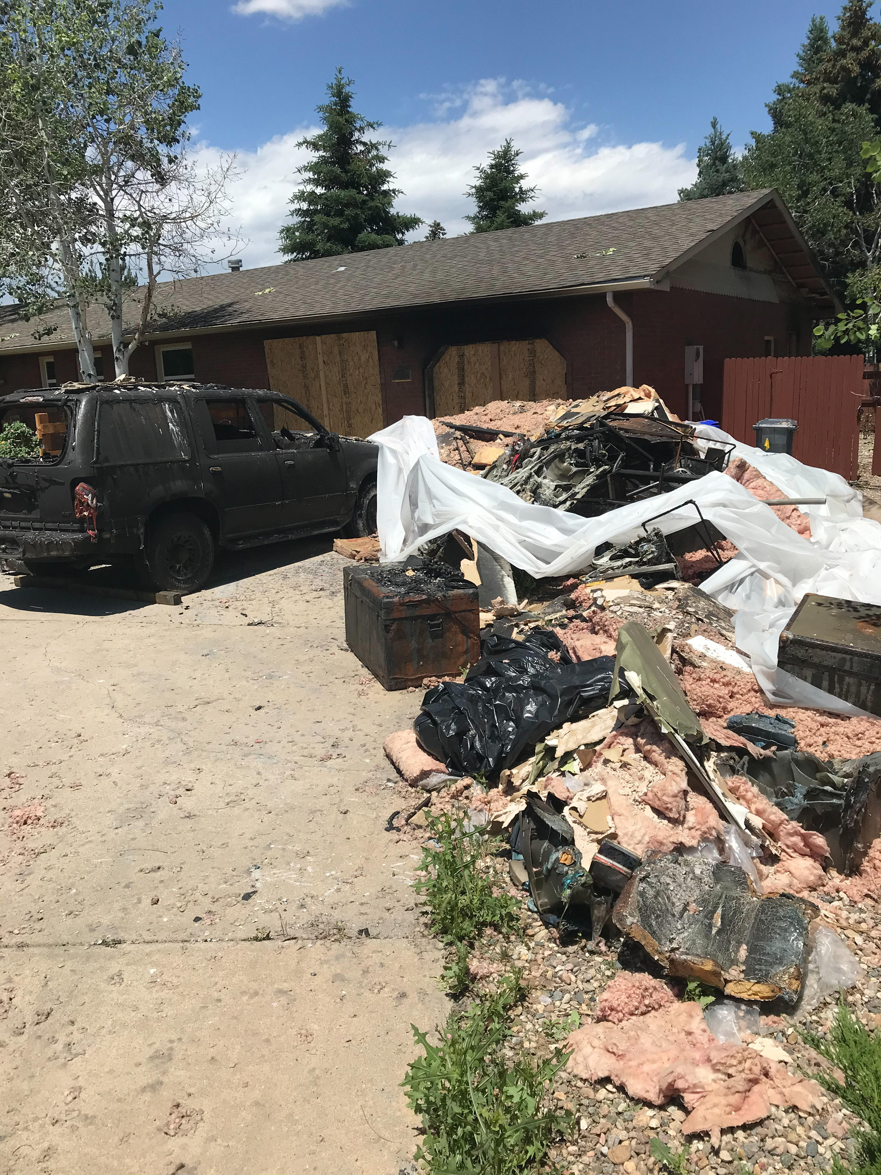 Debris dragged out of the home after a house fire.