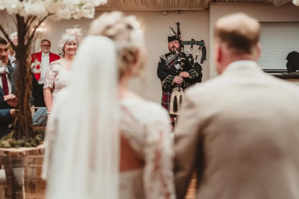 Images Andrew Paton Highland Bagpiper