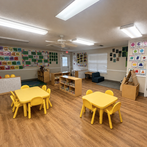 Bright and colorful preschool classroom at Childcare Network with age-appropriate learning materials