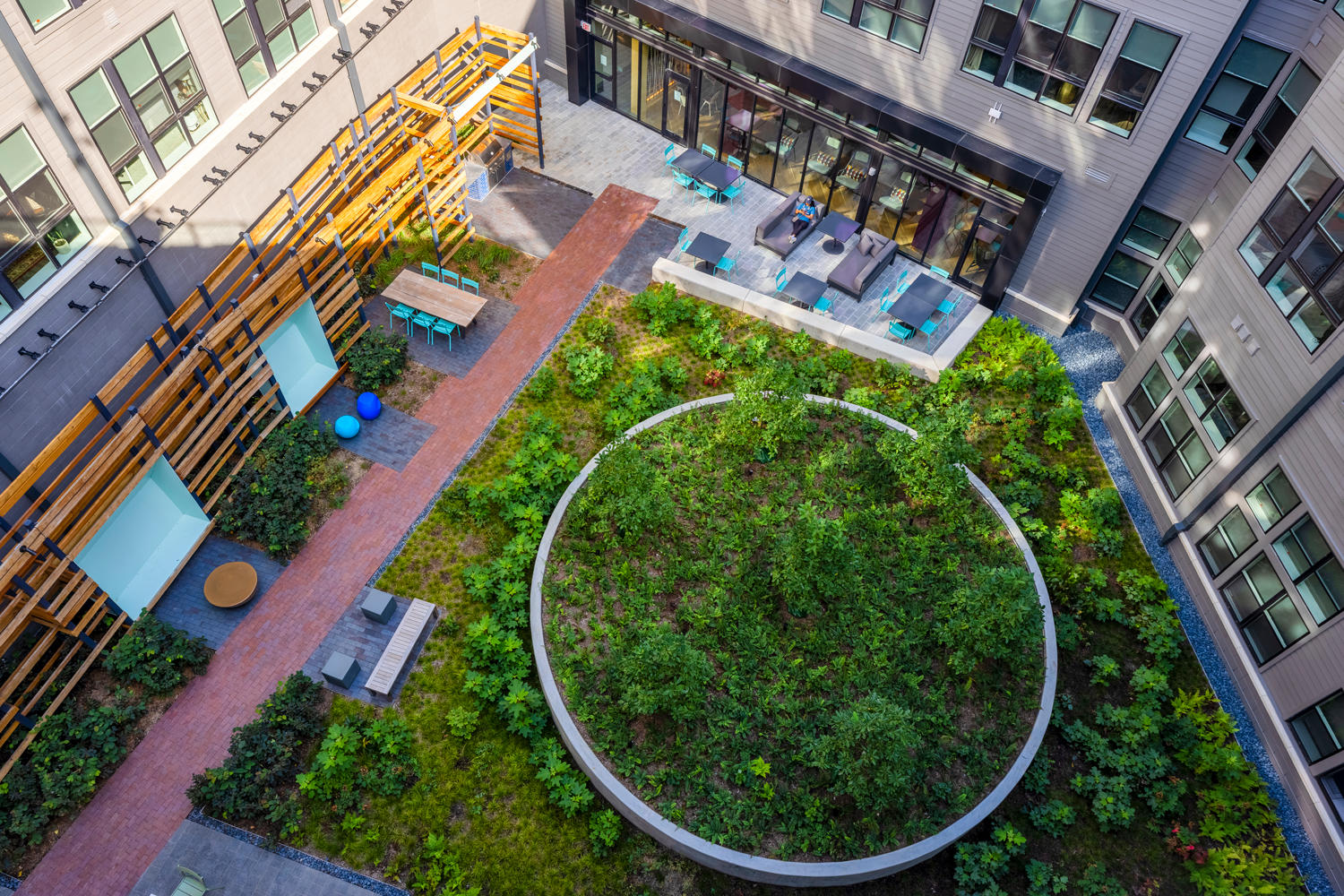 View the atrium from the Lanai-inspired rooftop lounge