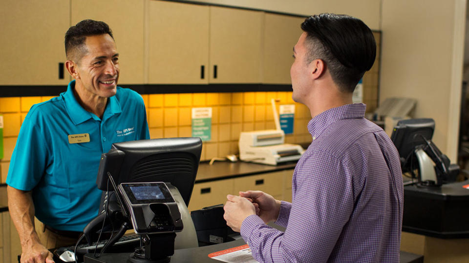 Employee helping customer at the counter