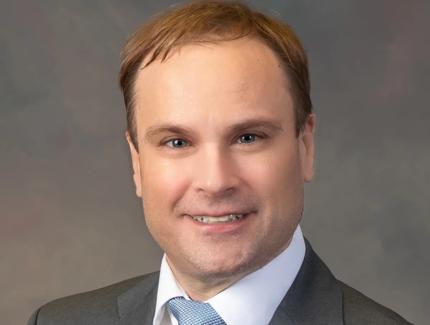 Adam Thomas, MD