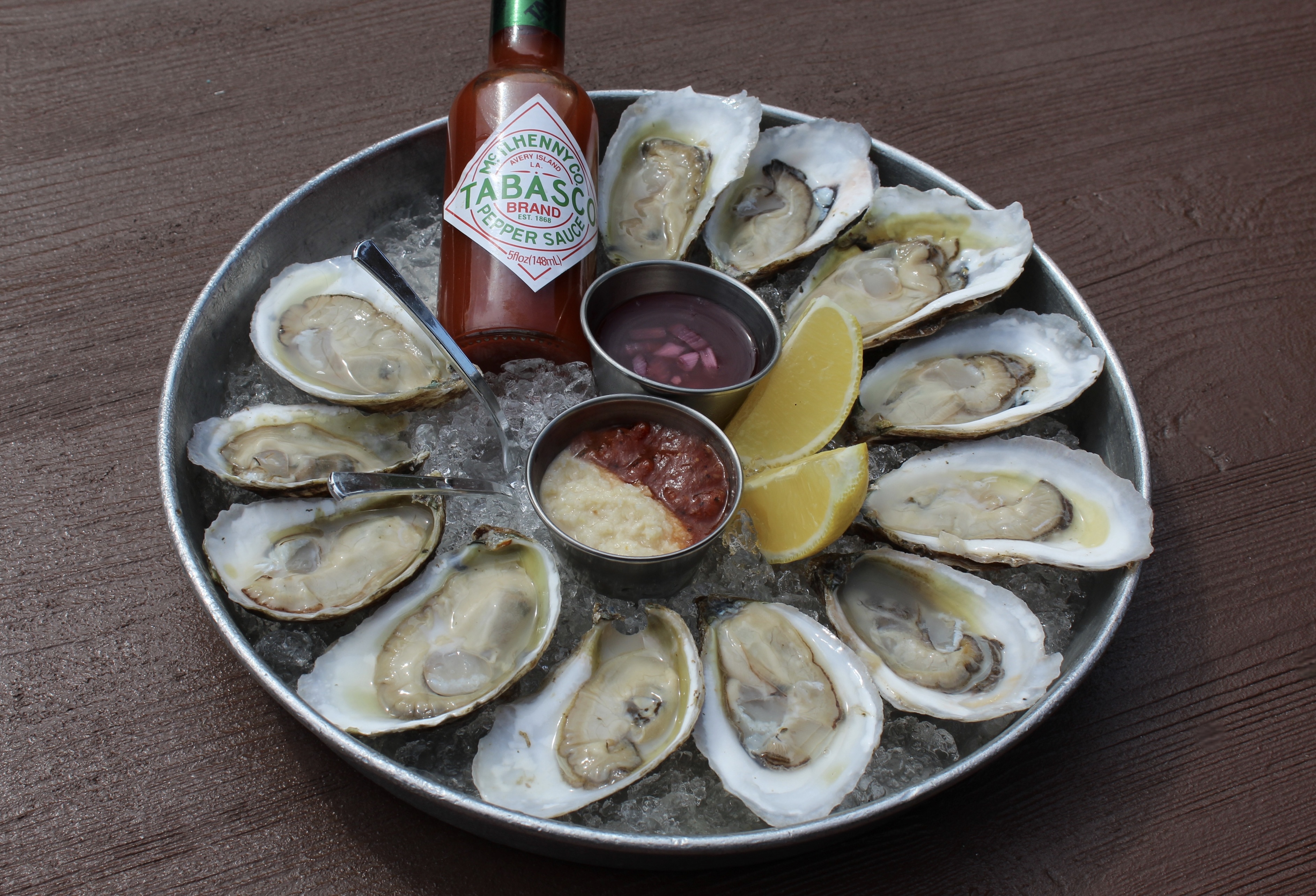 Dozen of Mama's On The Half Shell's freshly shucked oysters 