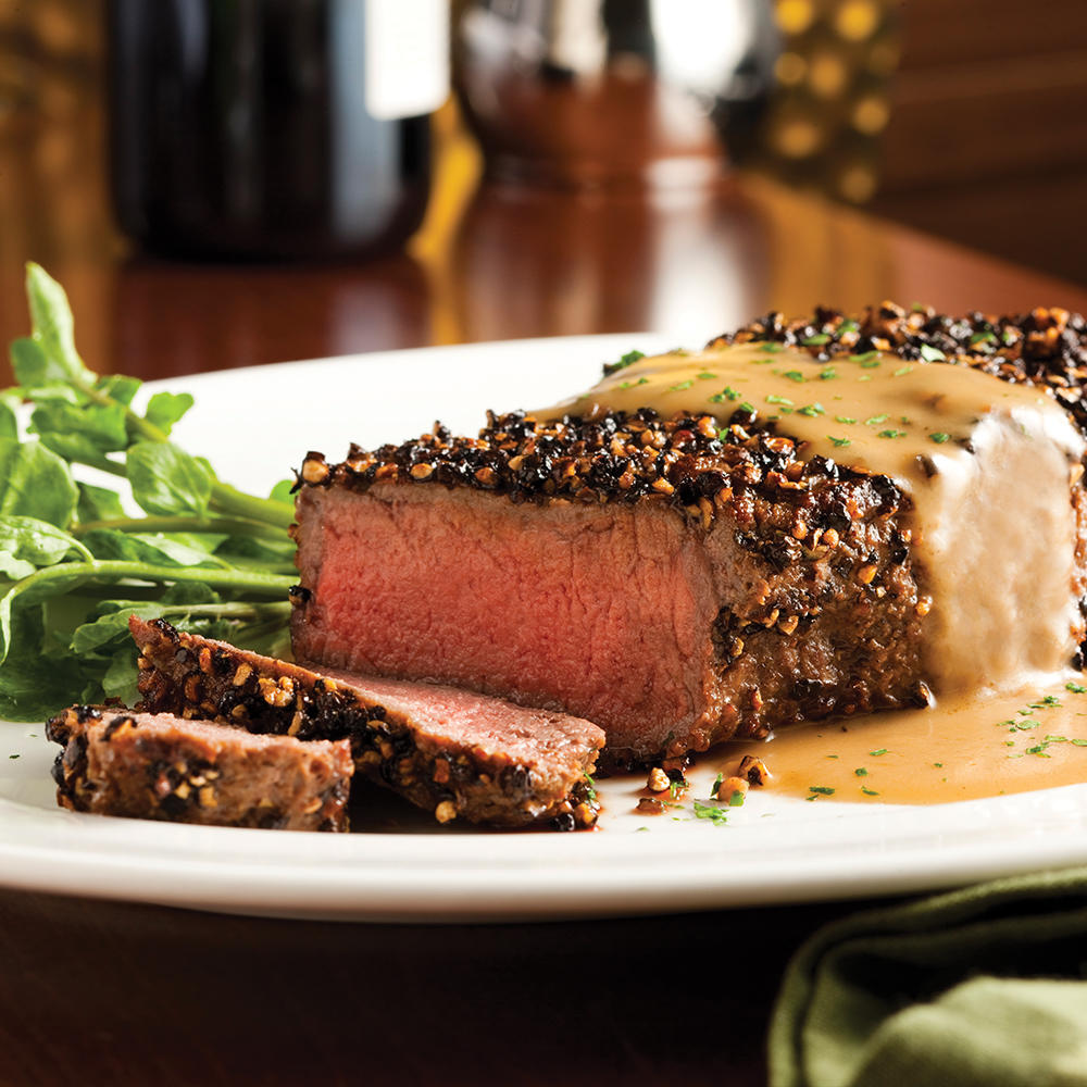 14 oz Dry Aged NY Strip au Poivre finished with our housemade Courvoisier Cream for a decadent finis The Capital Grille Salt Lake City (385)419-3888