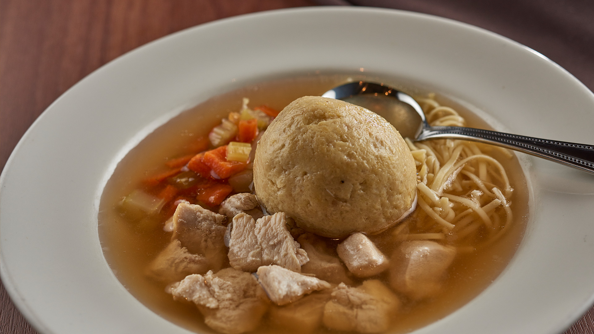 Matzo Ball Soup. Myron’s Delicatessen® doles out an extra helping of New York culture complete with humor, artwork, and music along with the best corned beef, pastrami, and classic delicatessen fare. You’ll get your fill of fun and food, guaranteed. Find all the Myron Cohen slogans that decorate the delicatessen and the waitstaff’s uniforms, including his famous “Everybody gotta be someplace” and “It’s not a question."