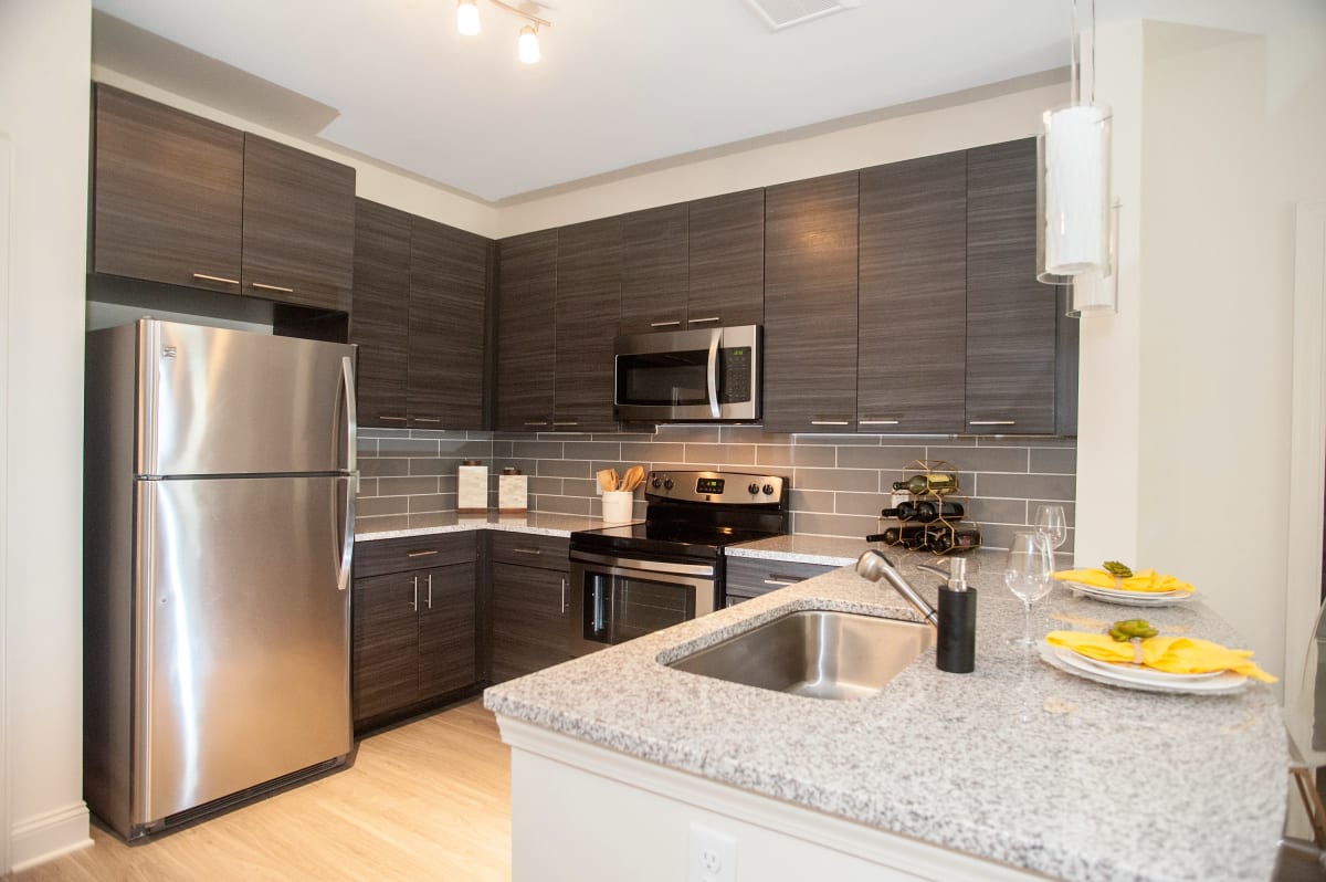 Model kitchen at Fifth Street Place Apartments