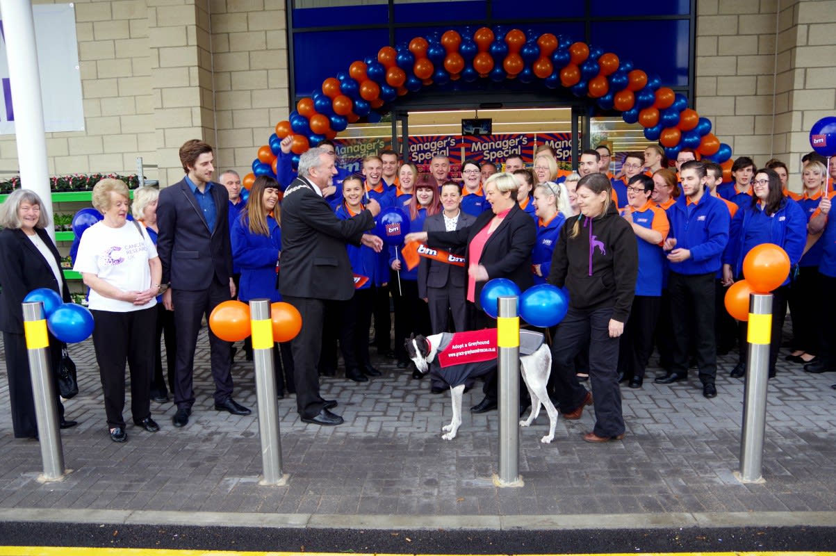Mayor Dennis Teasdale cuts the ribbon at B&M's new store at Cleveland Gate Retail Park, Guisborough.