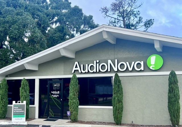Exterior photo of the entryway for AudioNova hearing clinic in Tavares, FL