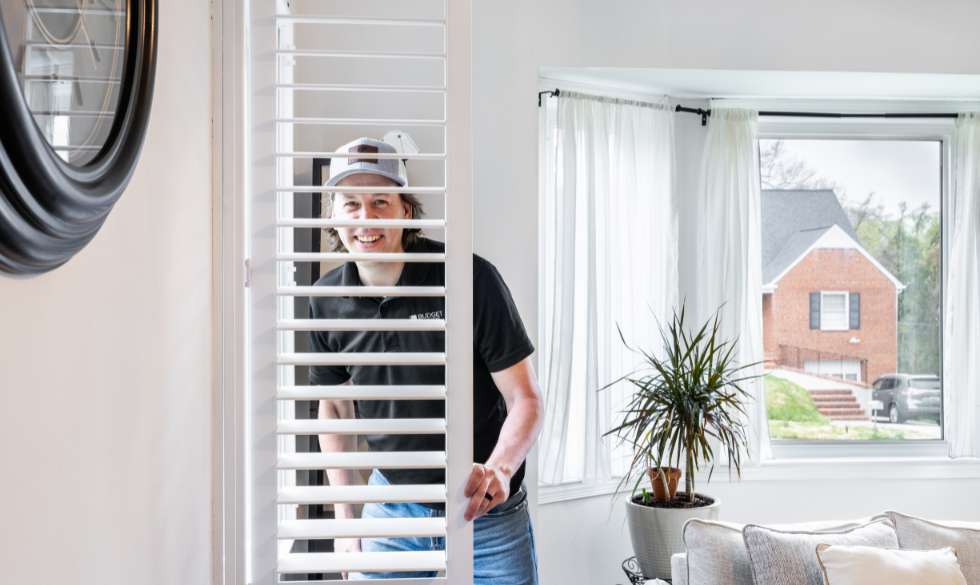 Budget Blinds of Greater Baltimore owner, Caleb at an installation.