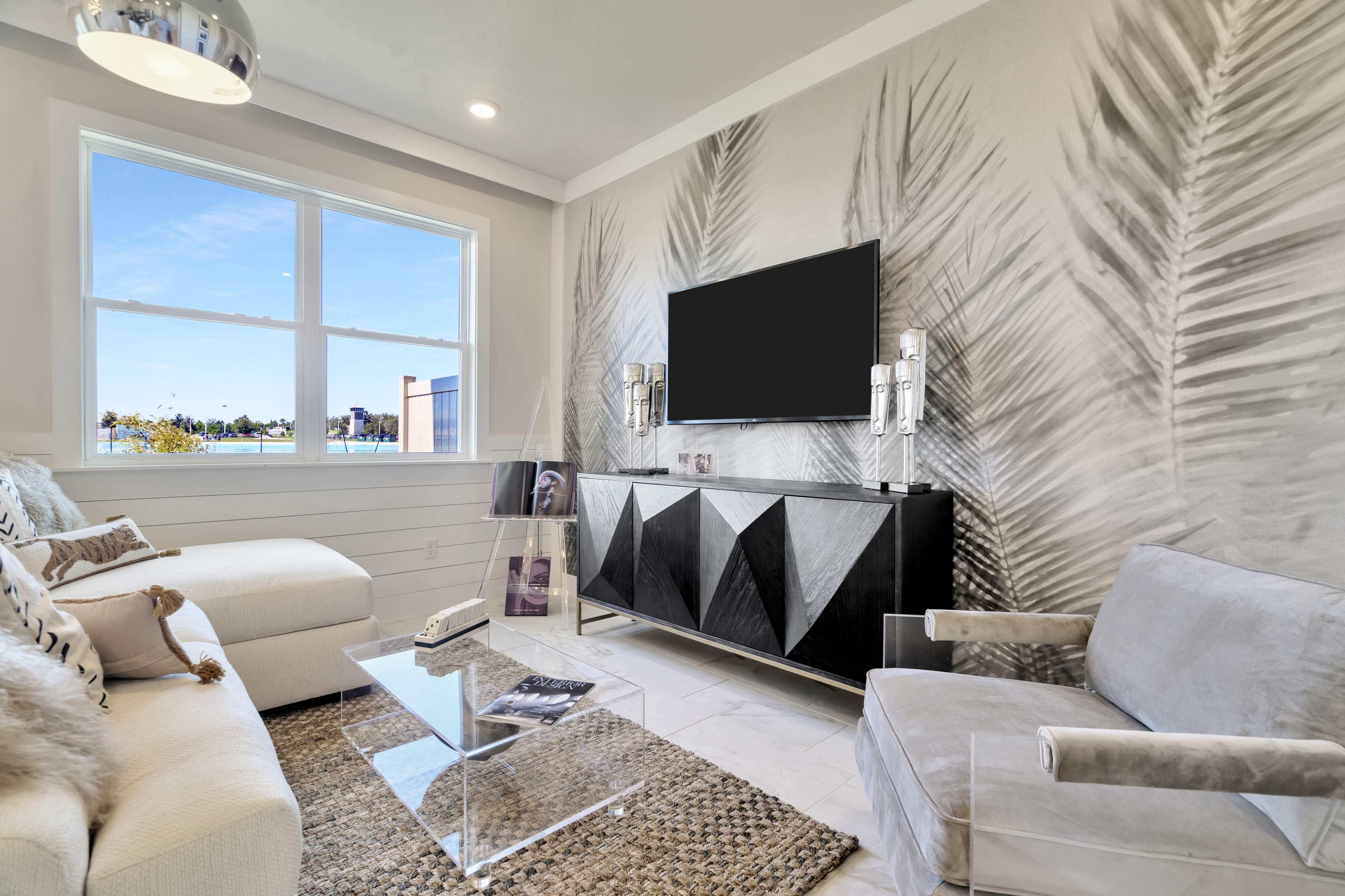 The Living Room of a DRB Homes Abaco Model at Lagoon Residences at Epperson in Wesley Chapel, FL.