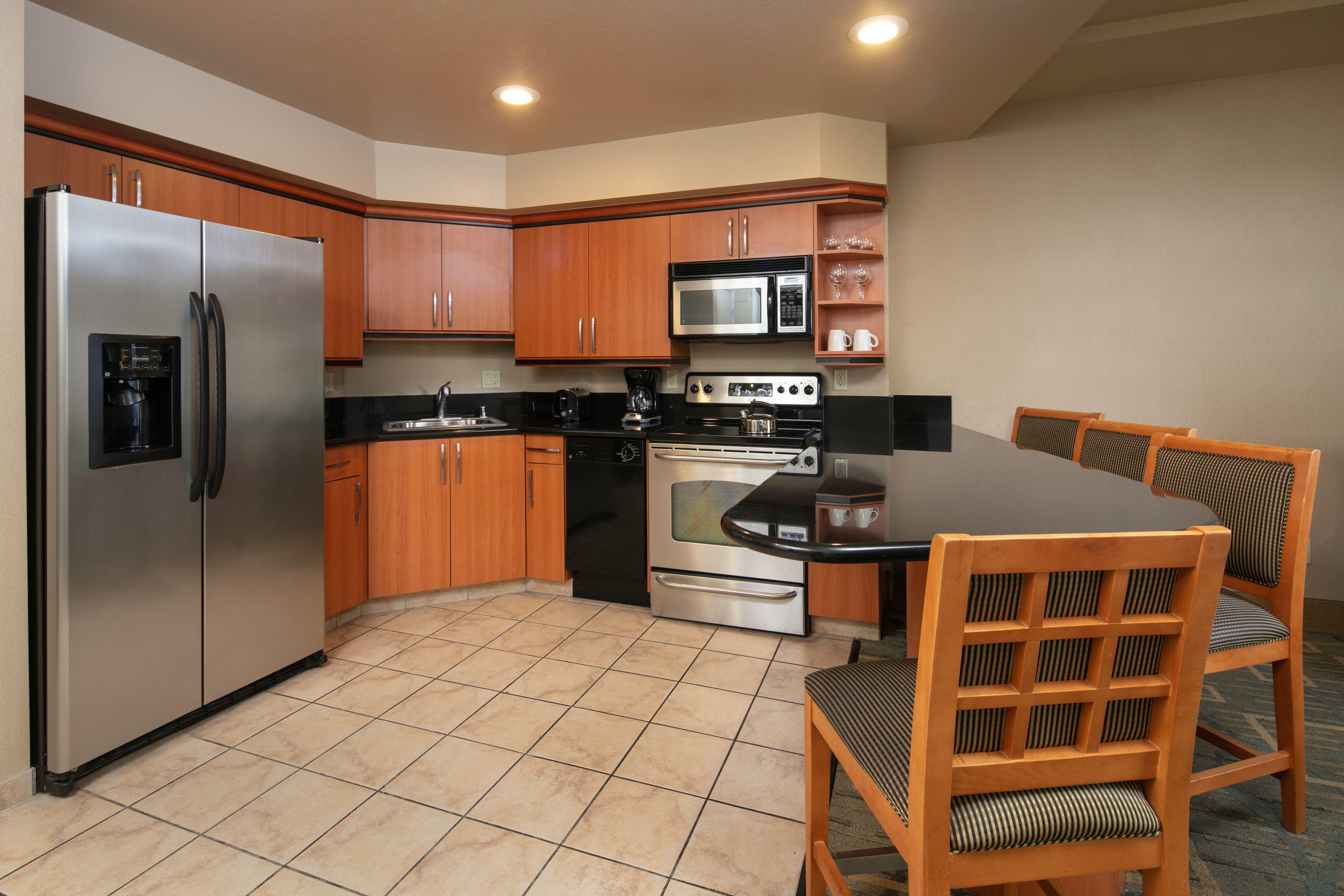 fully stocked kitchens in every suite
