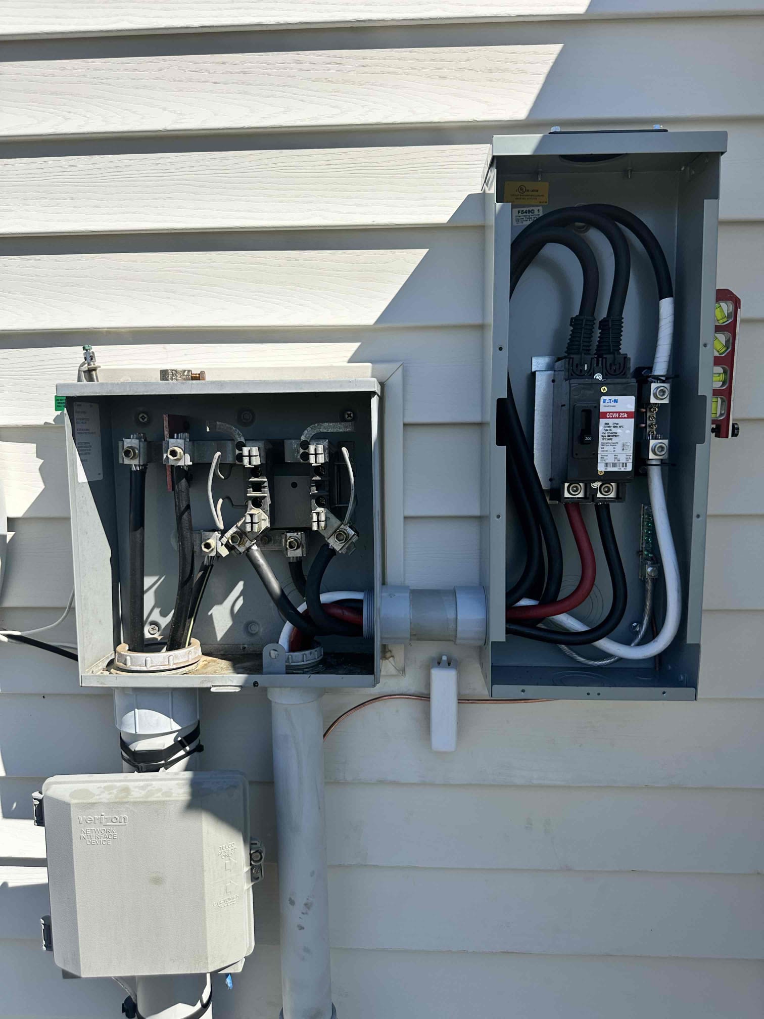 Thomas Edison Electric installed a new Eaton 200-amp main disconnect alongside the existing meter base at a Lebanon, PA home. The side-by-side configuration connects utility power to the Eaton CCVH 254 breaker before feeding the interior panel.