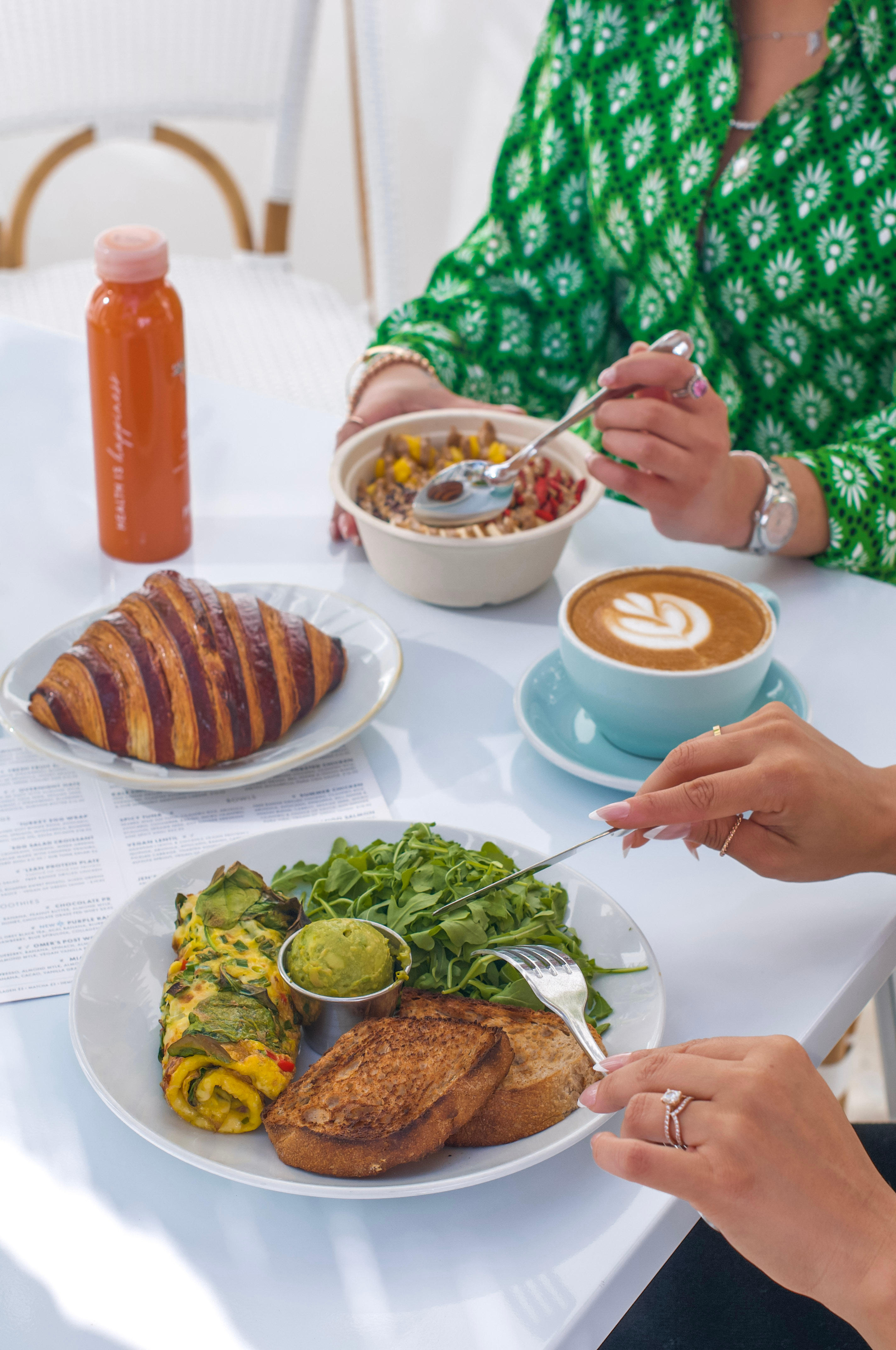 Perfect Brunch ft veggie omelette, freshly baked croissant, acai bowls, coffees, juices