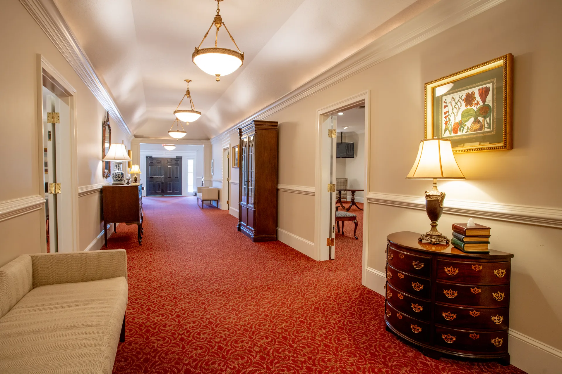 Interior hallway connecting the chapel and visitation rooms.
