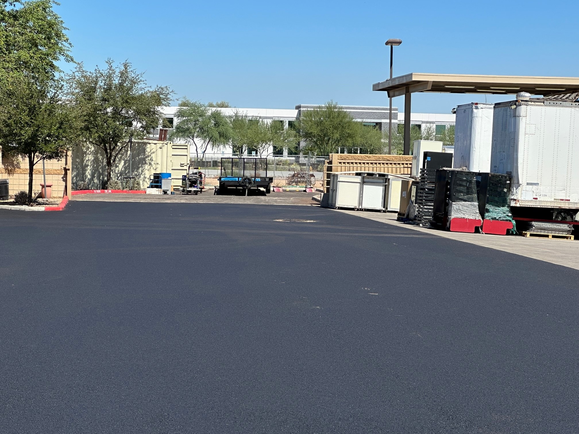 Finished reconstruction of delivery area for better drainage/Chandler, Arizona/Contact Pinnacle Paving and get help solving your pavement problems