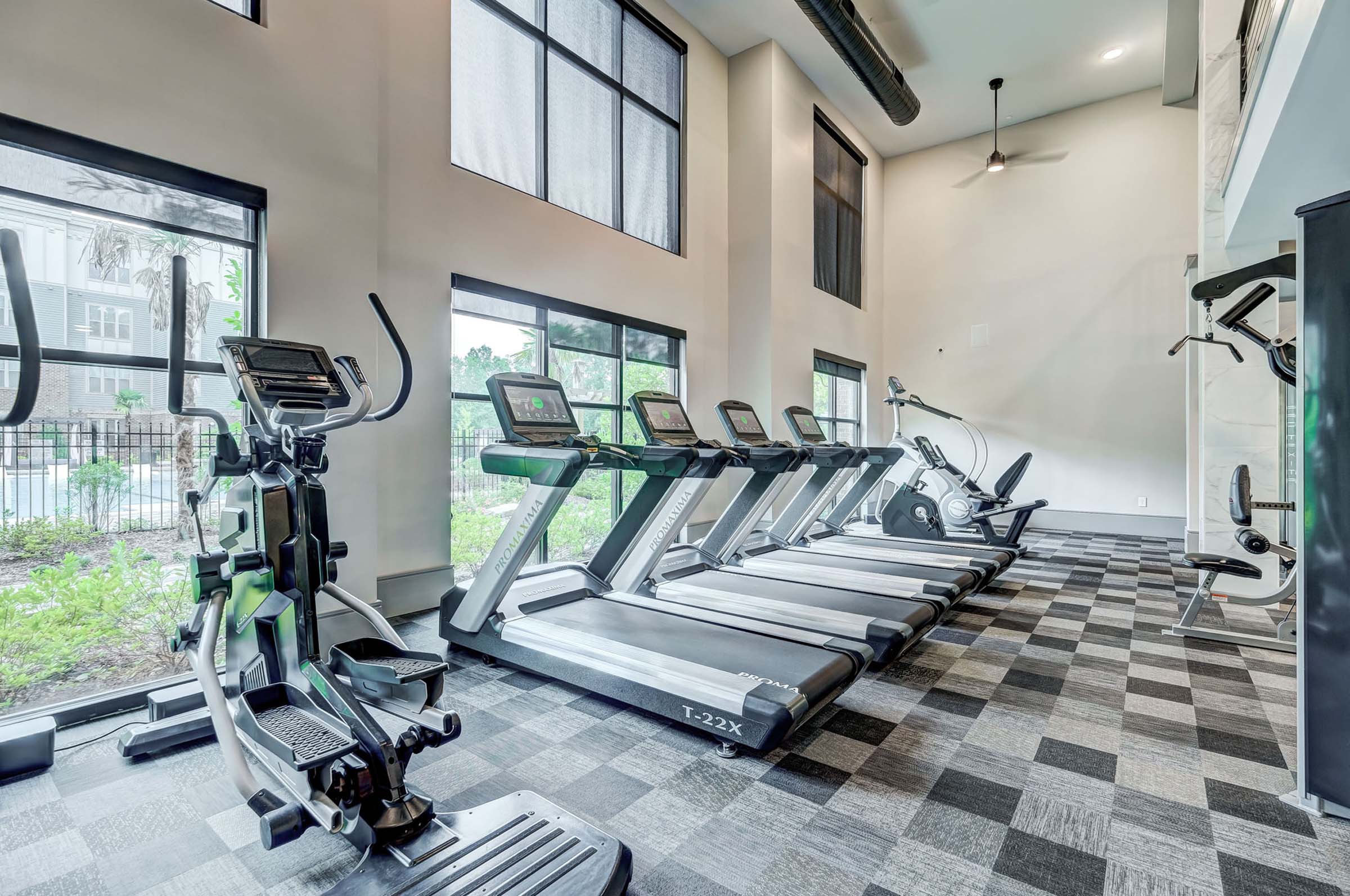Cardio equipment at Camden Alpharetta apartments in Alpharetta, GA