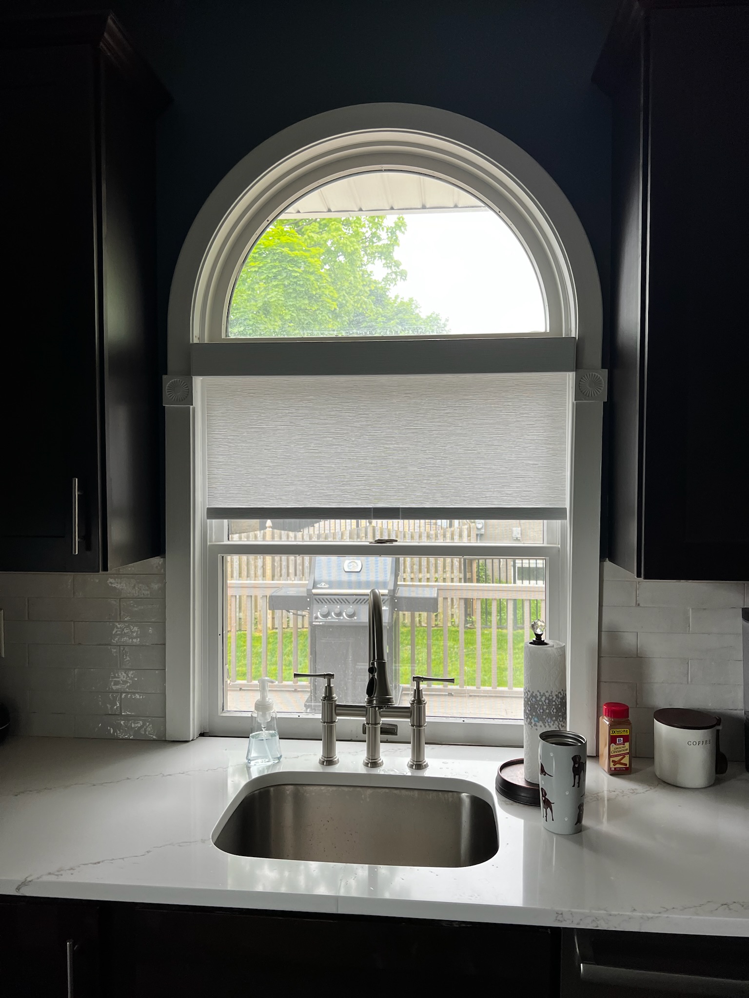 This roller shade is stunning on this kitchen window!