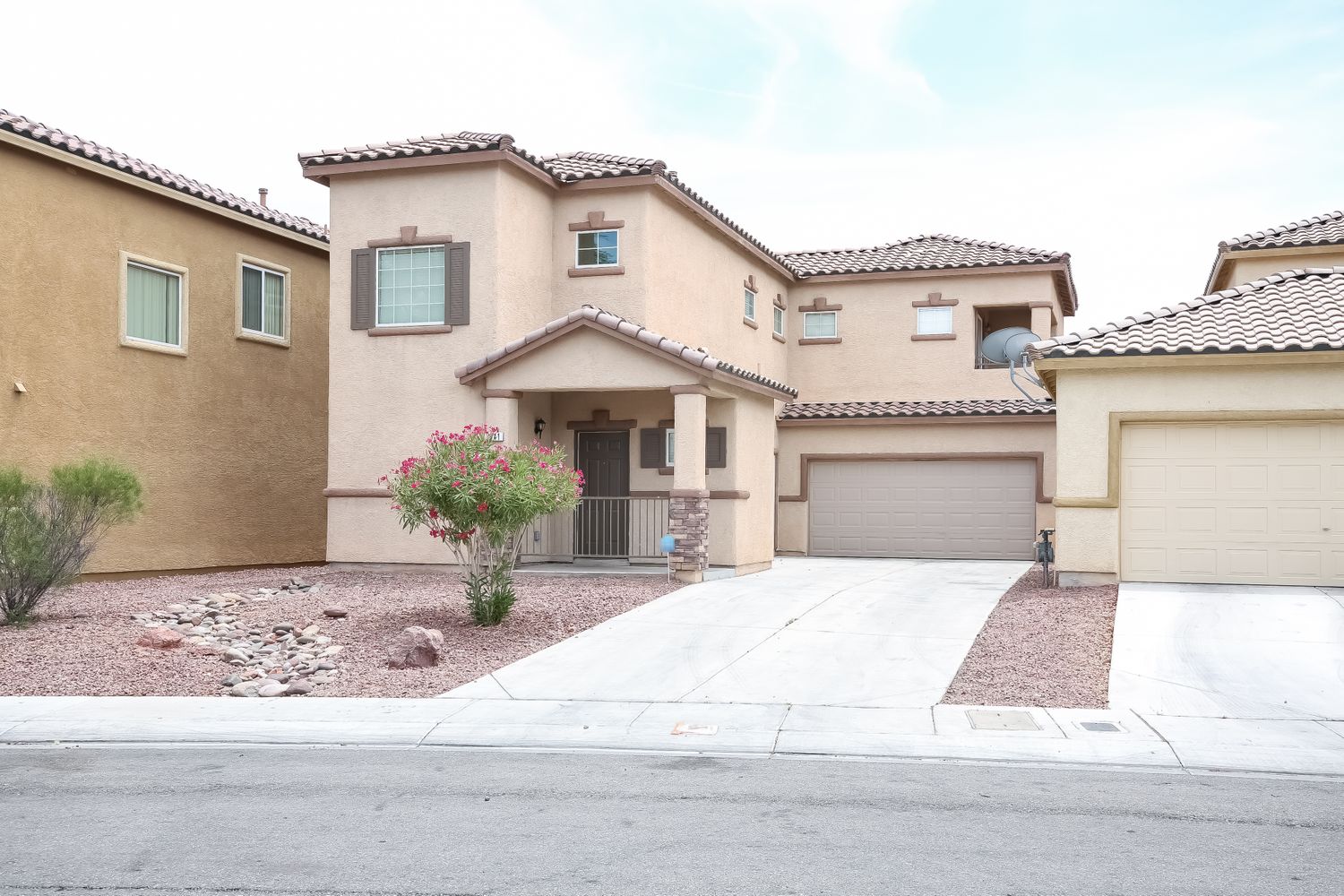 Modern home with two-car garage at Invitation Homes Las Vegas.