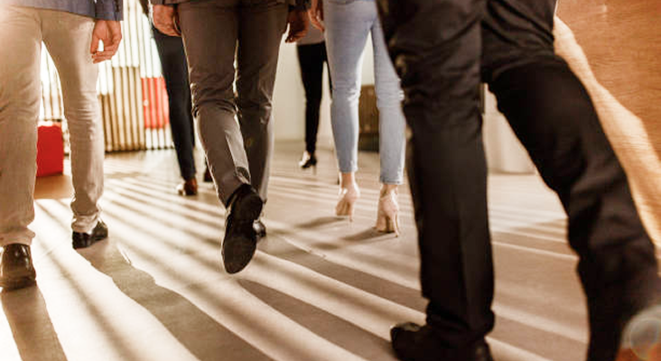 Business professionals walking together.