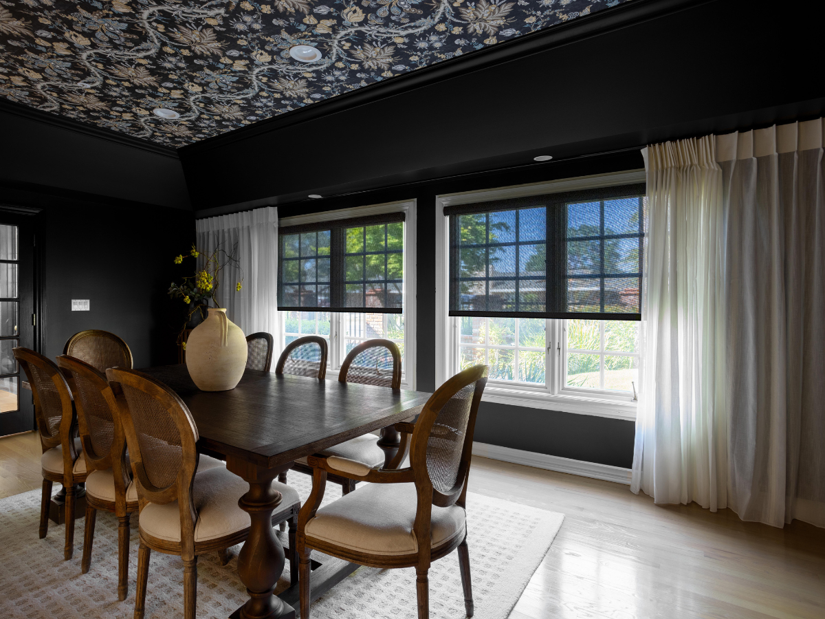 Embrace the dark and moody trend with our stylish window treatments. Our energy -efficient solar shades not only enhance your décor but also keep your dining room comfortable for entertaining guests.