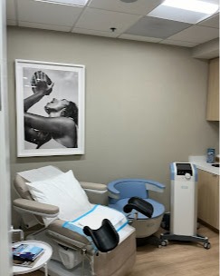 Private consultation room for Women’s Wellness Institute of Dallas and cosmetic gynecology services, designed for comfortable, confidential patient care and personalized treatment discussions.