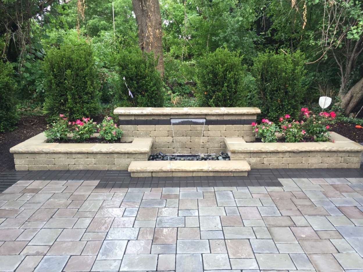 Garden with paver patio built by M & D Design & Build